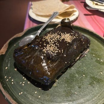Guelaguetza signature dishes Mole Negro
Enchiladas Oaxaquenas
Quesadillas Fritas